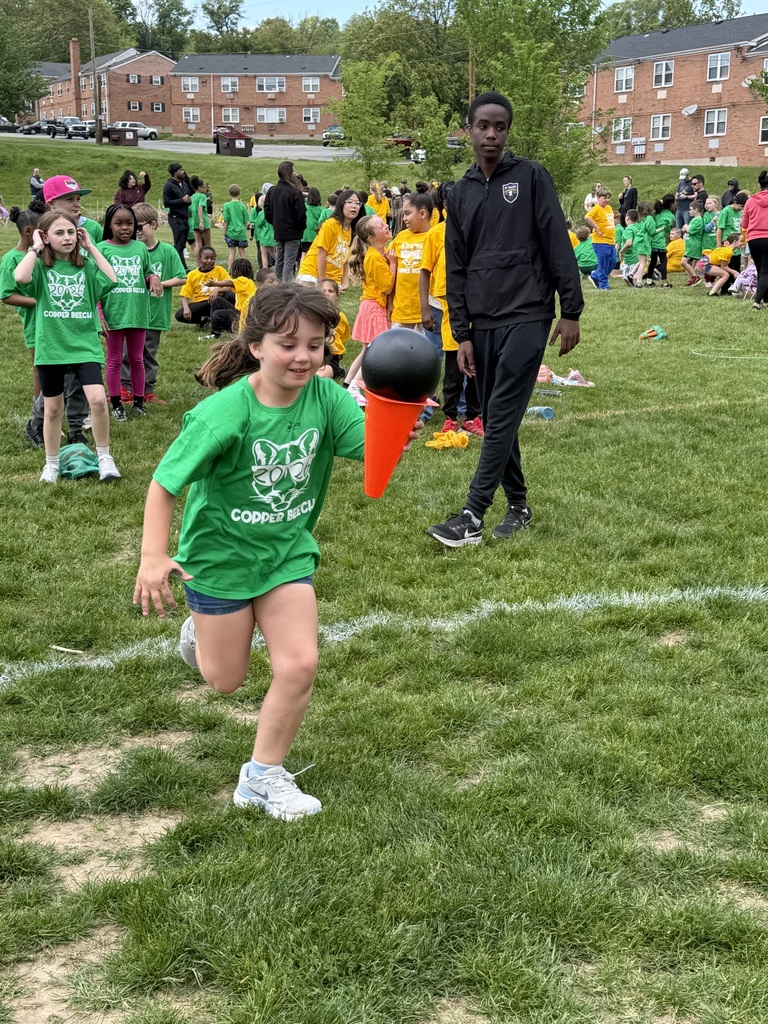 students running a race at field day
