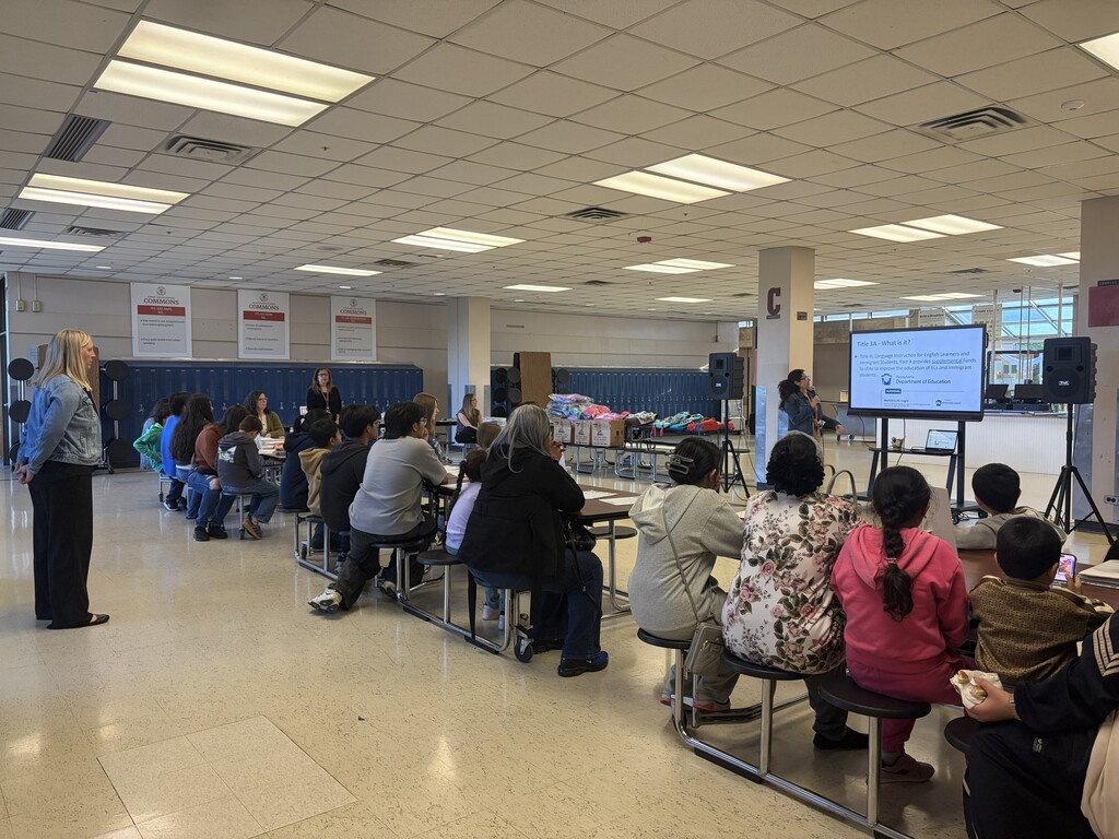 Ms. Allison Renye presents to families in Commons C