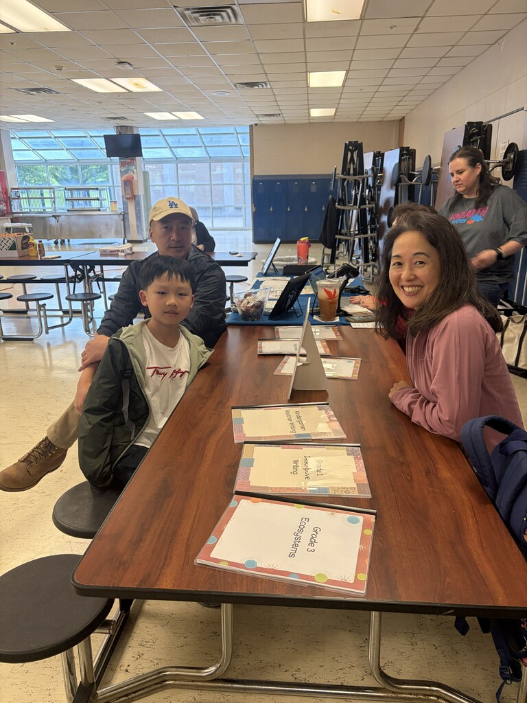 Ms. Kwon with one of her students and their parent