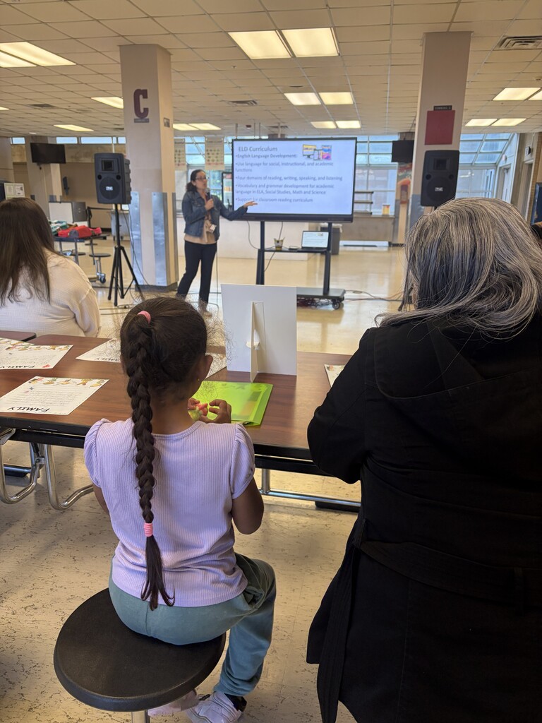 Ms. Allison Renye presents to families in Commons C