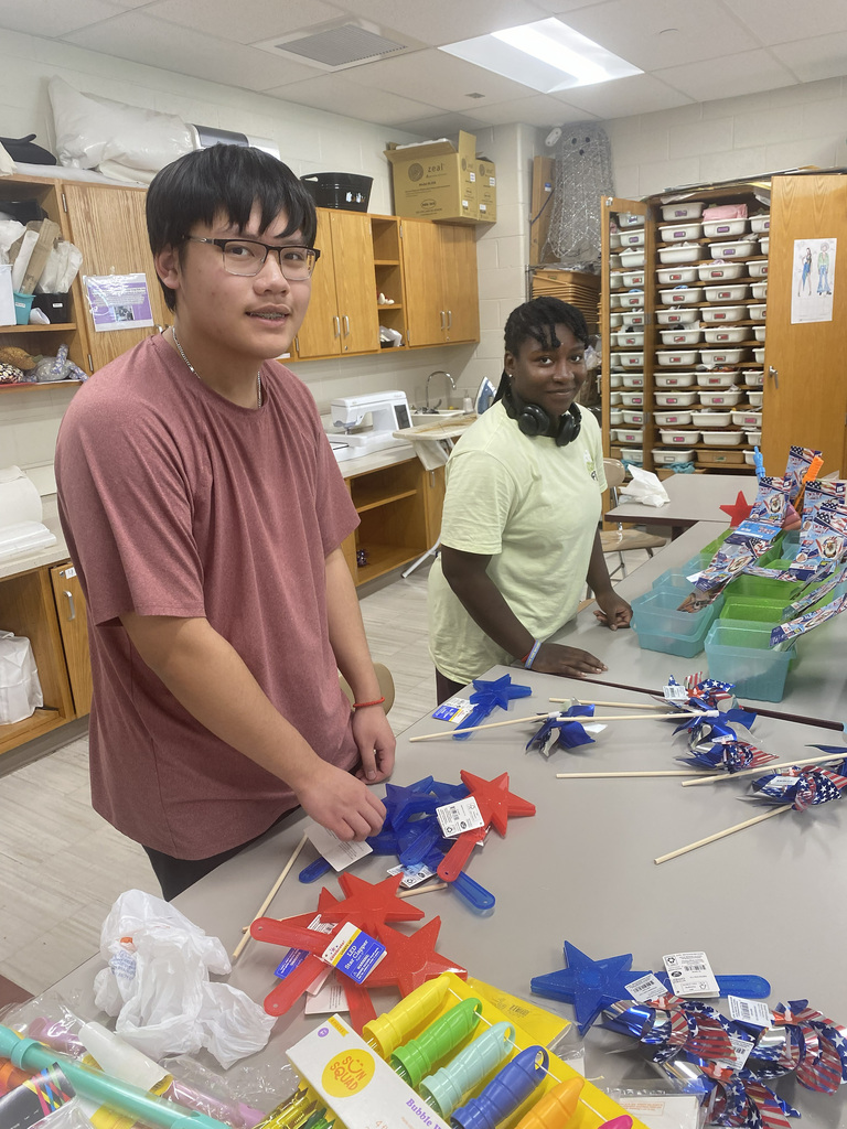 Students pack Summer Toy Gift Baskets for children of incoming military families