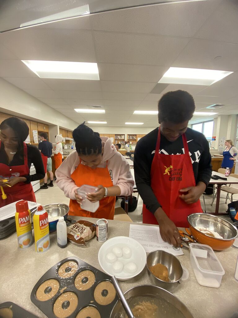 Abington High School students preparing a meal