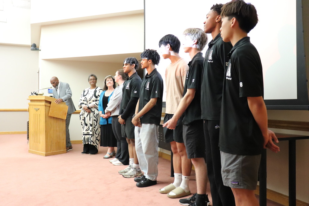 Boys volleyball team being honored at the Board meeting