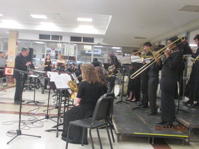 Mr. Detato conducting for the ASHS Jazz band at the annual Jazz band cafe