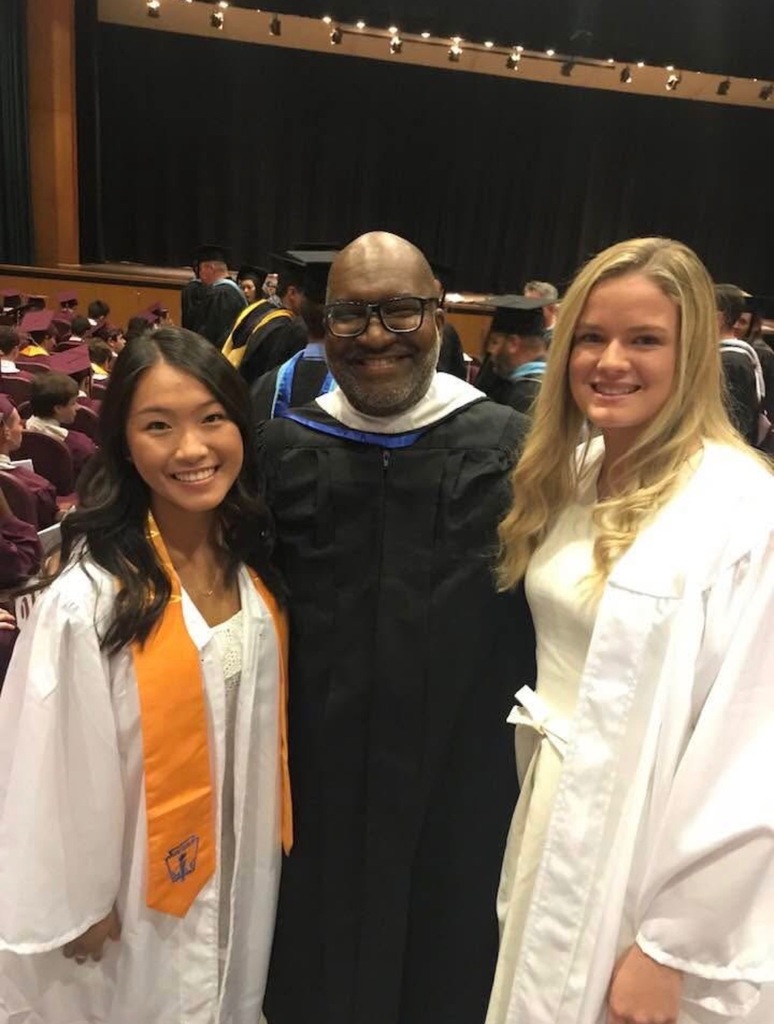 Mr. Griffin and students at graduation