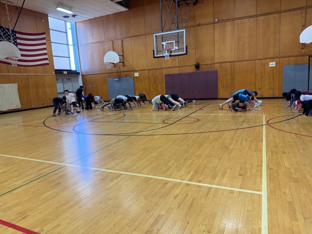 Image of 6th grade students participating in the Sharks Olympics. 