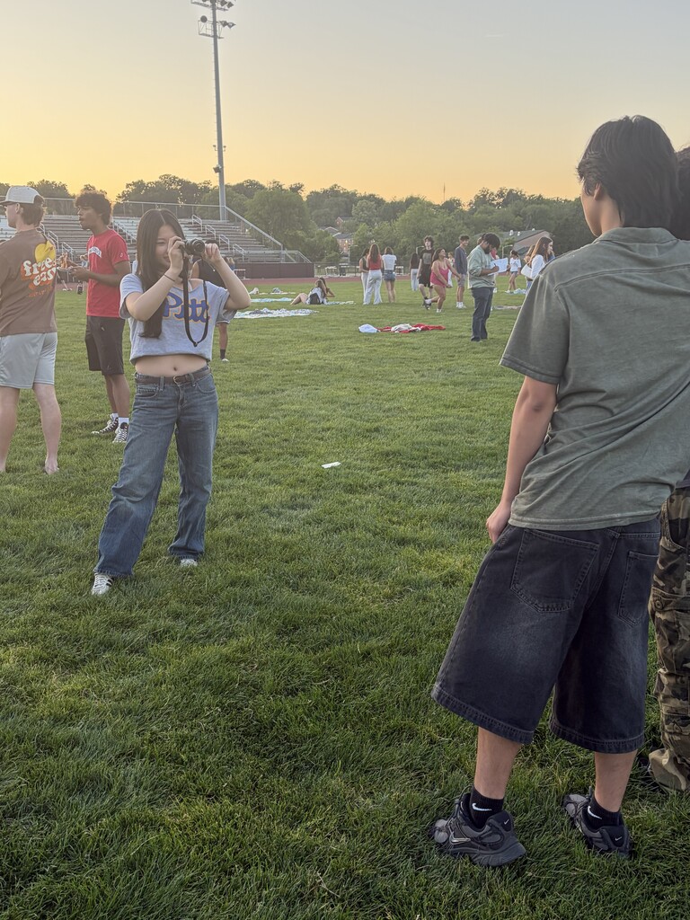 Students take photos at Senior Sunset