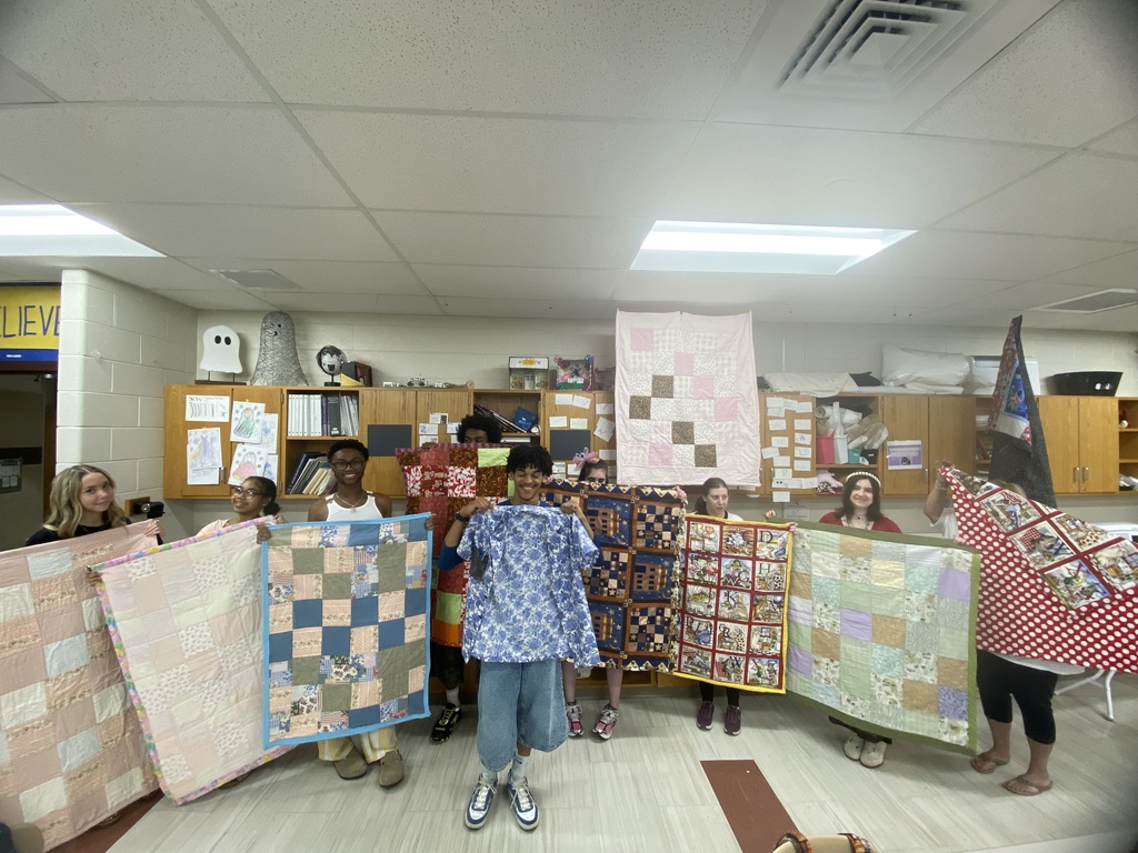 students showing their projects
