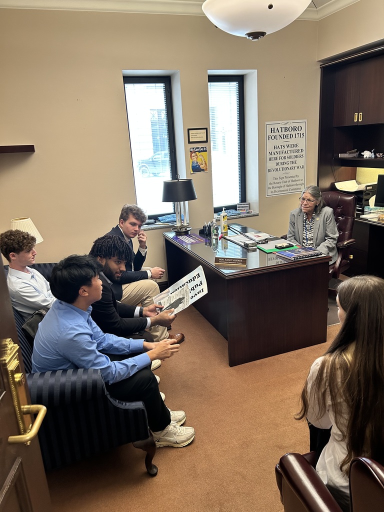 Students sit and talk with Rep. Nancy Guenst in her office in the Capitol