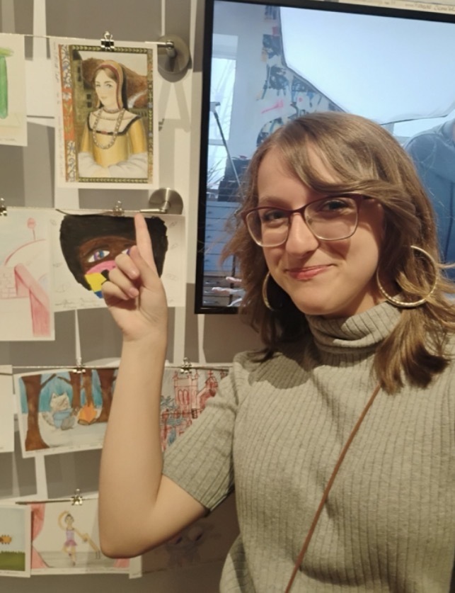 student with artwork