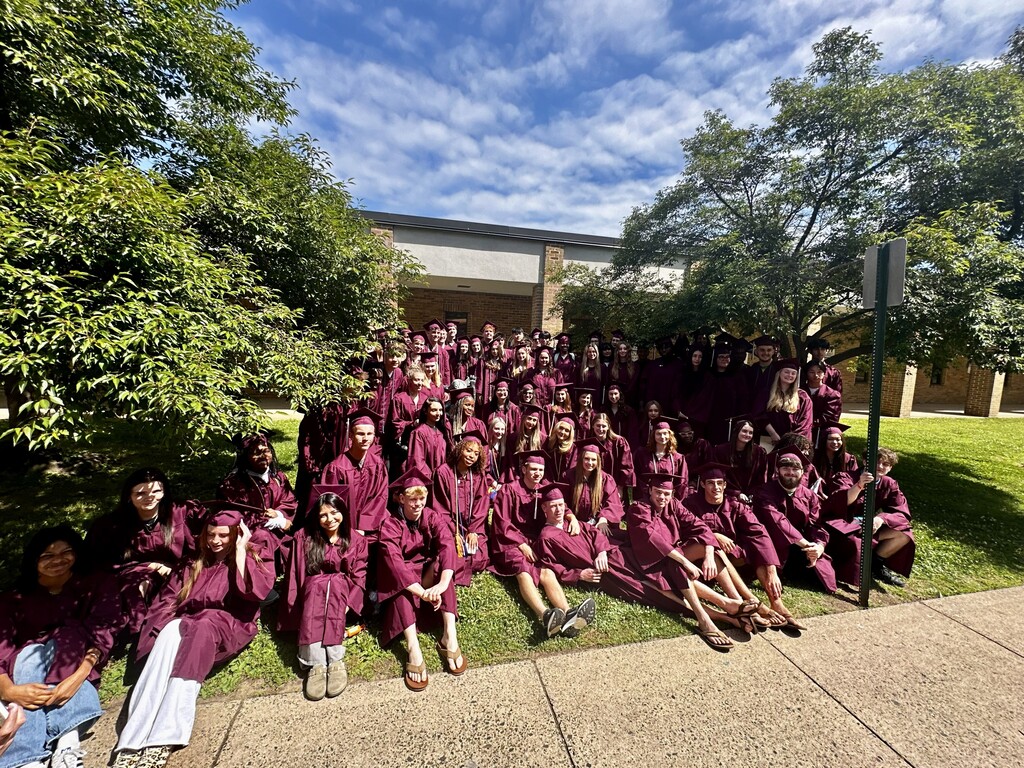 Students at McKinley take a group photo in their caps and gowns