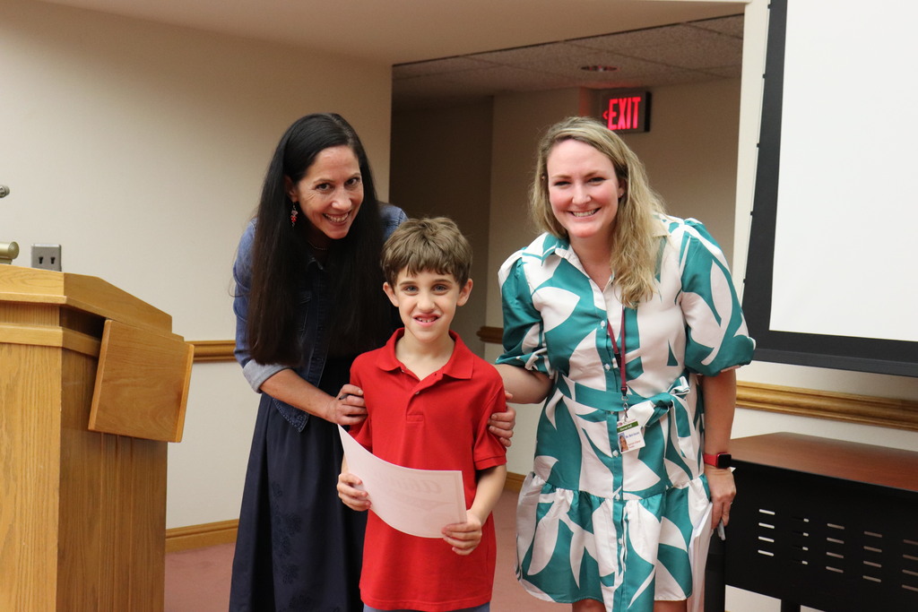 Ms. Captiolo and Ms. Vaccaro with one of the student athletes
