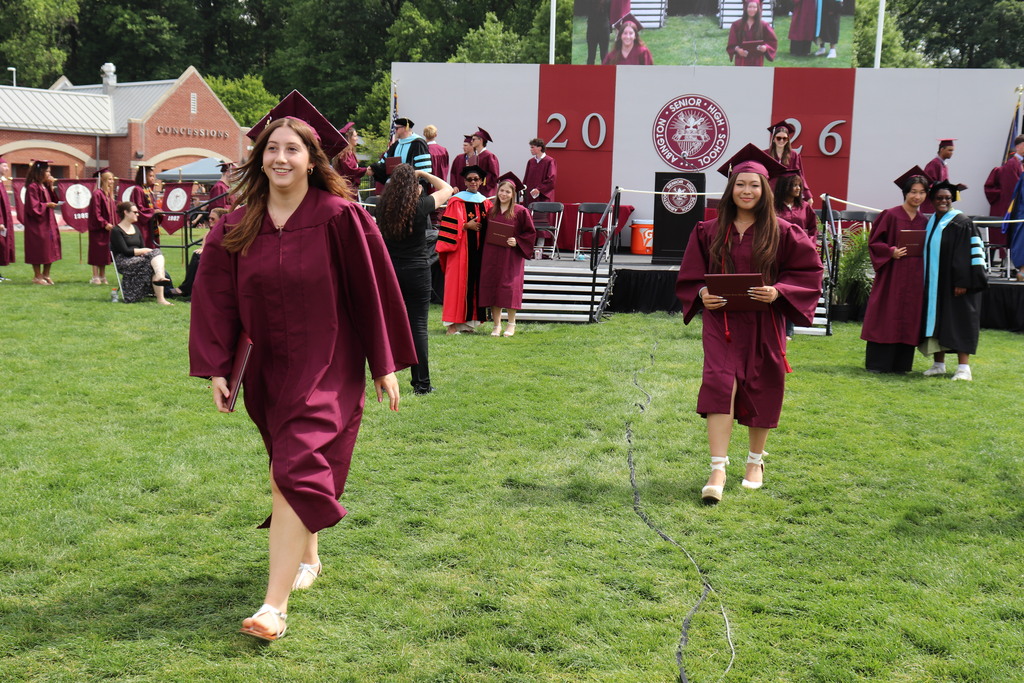 Graduates receive their diplomas