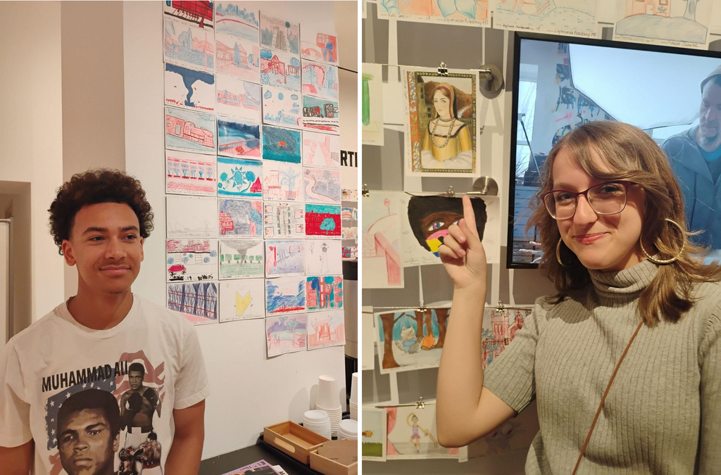 Ethan Scott (9th) and Esther Eads (10th) stand next to the postcard exhibit