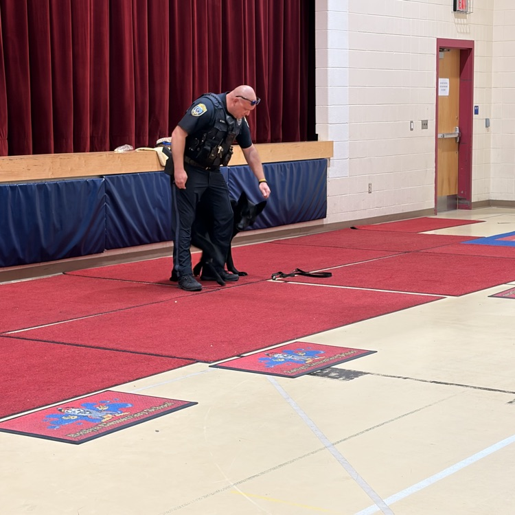 Shadow demonstrates the tricks he knows with Officer Jones