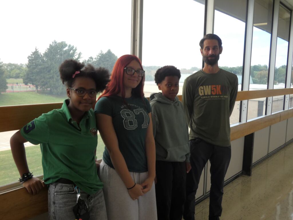 Students and staff at AMS wear green for Start with Hello Week