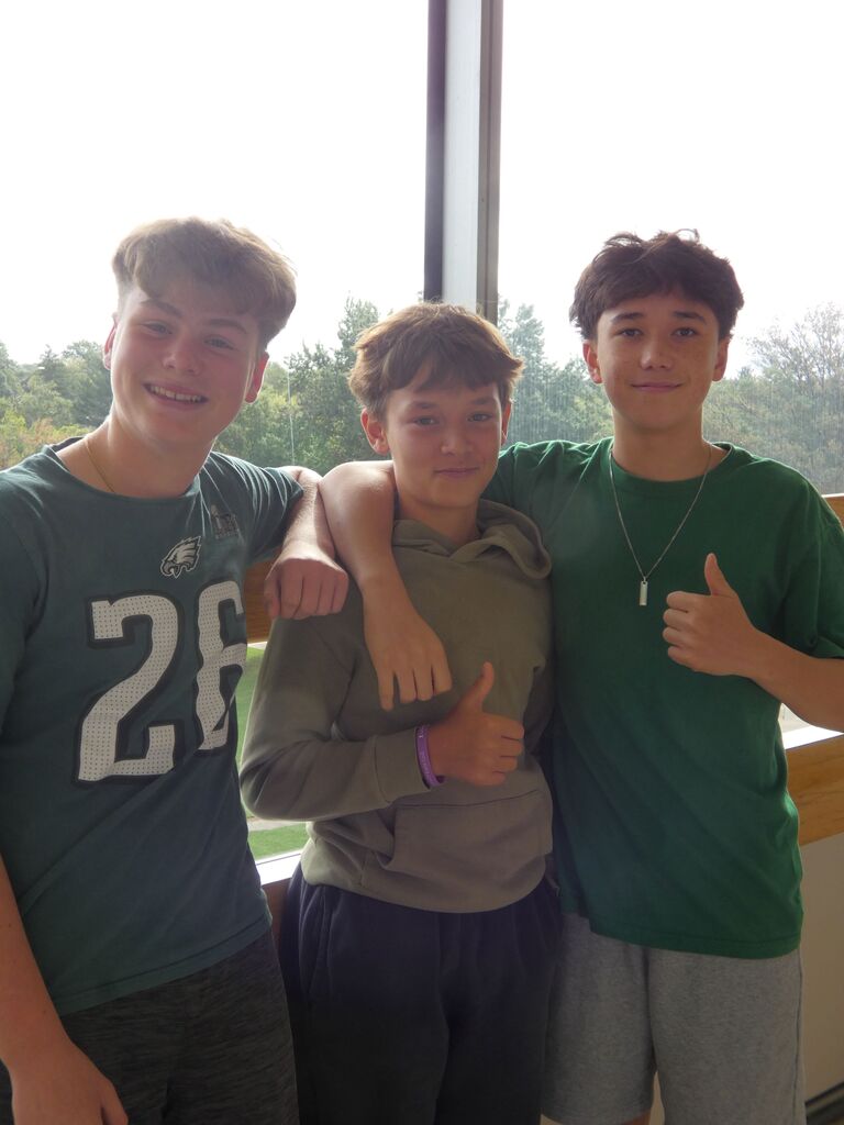 Students and staff at AMS wear green for Start with Hello Week