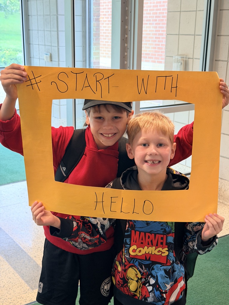 students smiling in a start with hello frame