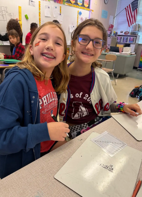 Image of Stingray 6th grade students school spirit event wearing phillies gear. 
