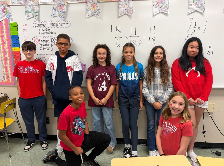 Image of Stingray 6th grade students school spirit event wearing phillies gear. 