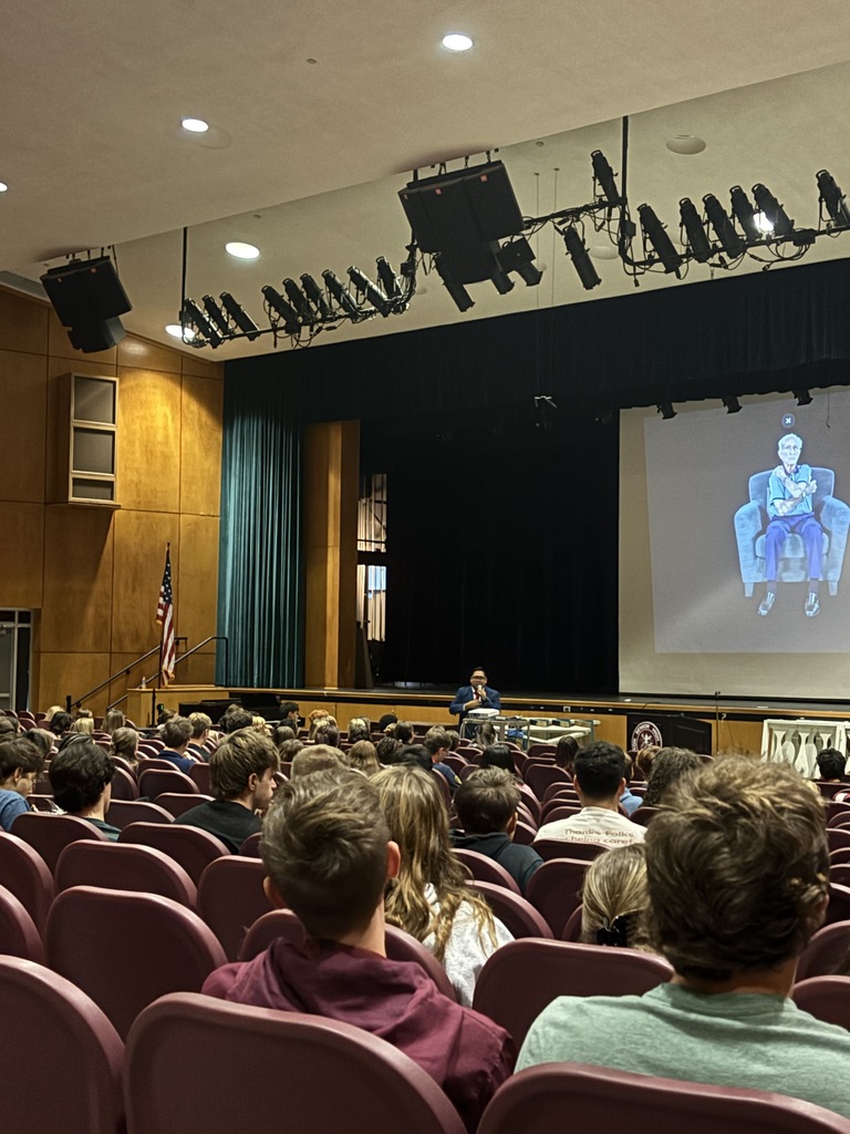 students interacting with hologram