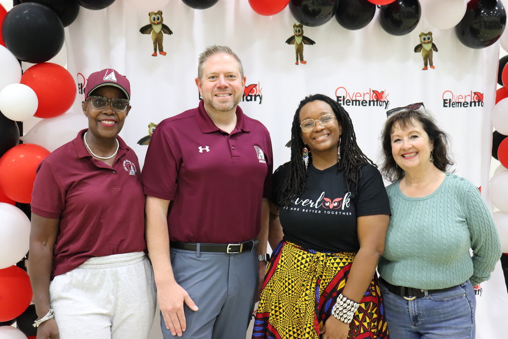 Dr. Fecher and School Directors in front of the Overlook step-and-repeat backdrop