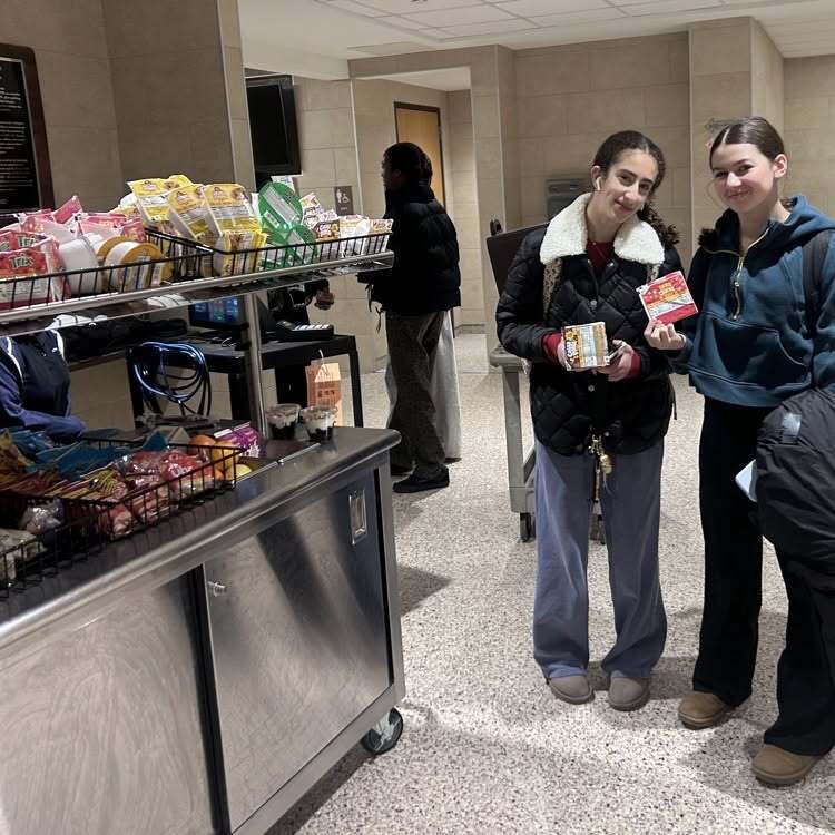 High school students grab breakfast at the mobile cart