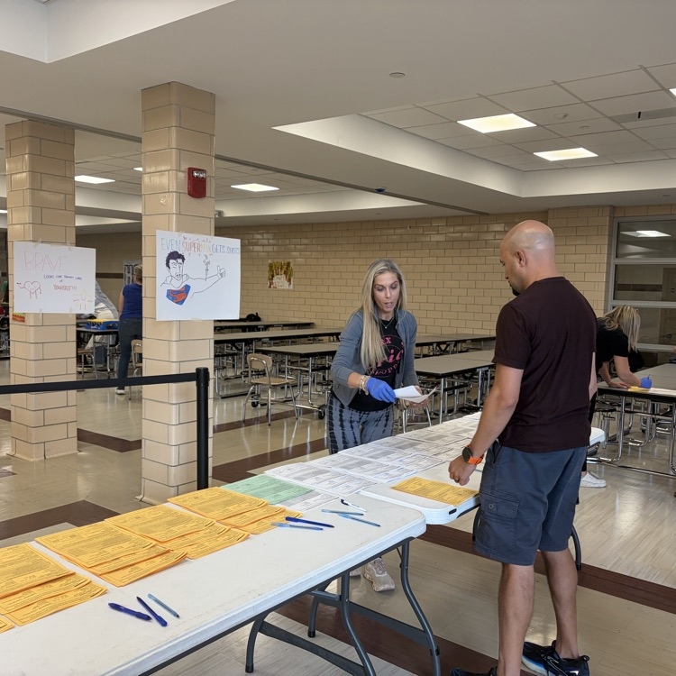 Eric’s Pharmacy reps registering attendees