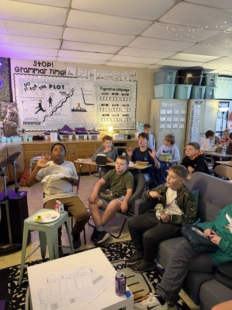 Image of homework club students celebrating. 