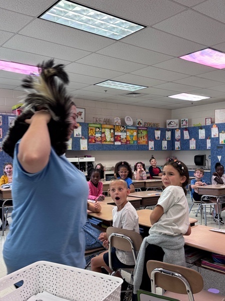 Students and skunk