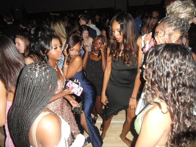 students dancing at the homecoming dance