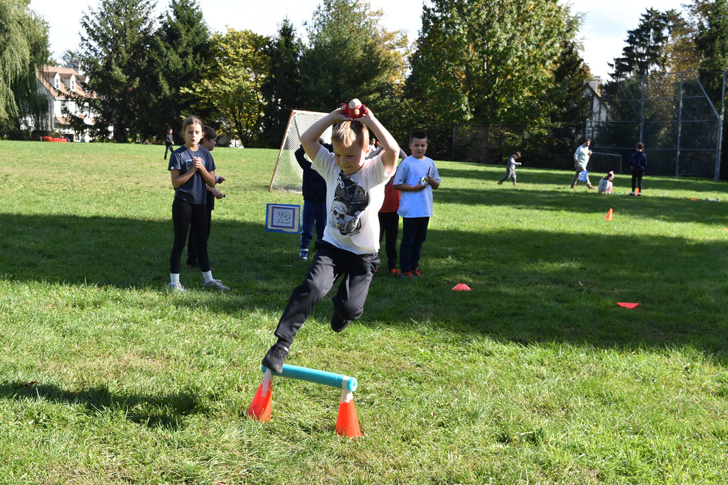 A second graders and his potato athlete jump hurtles