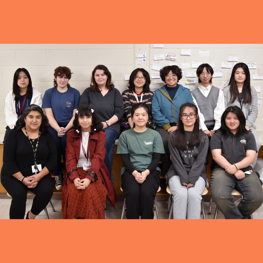 Members of the Quilting Club and Mrs. Vanassche pose while celebrating their win