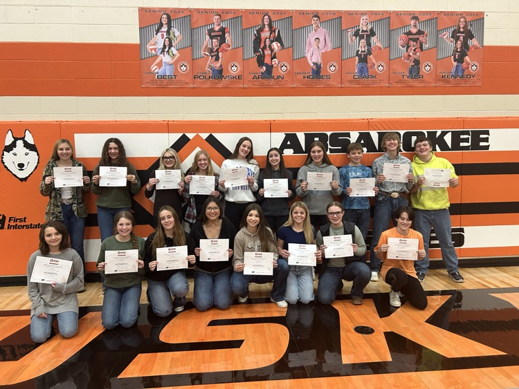 group of students with certificates 
