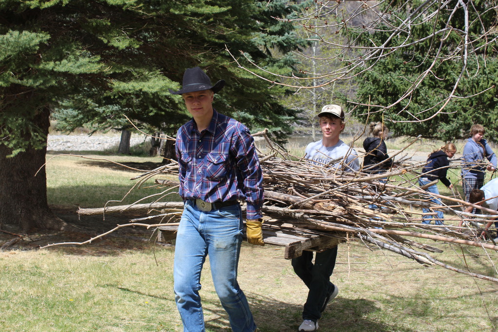 Picture of kids cleaning up town