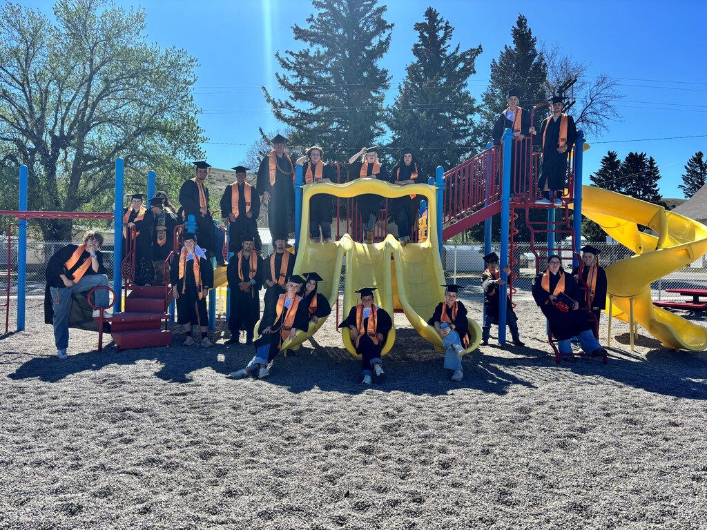 Picture of graduates on playground