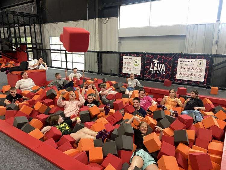 students in a foam pit
