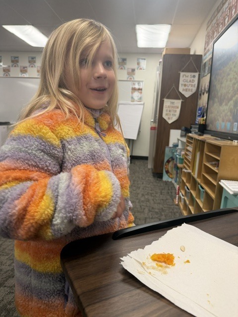 Each student got to feel a pumpkin seed and part of the pumpkin we carved out.