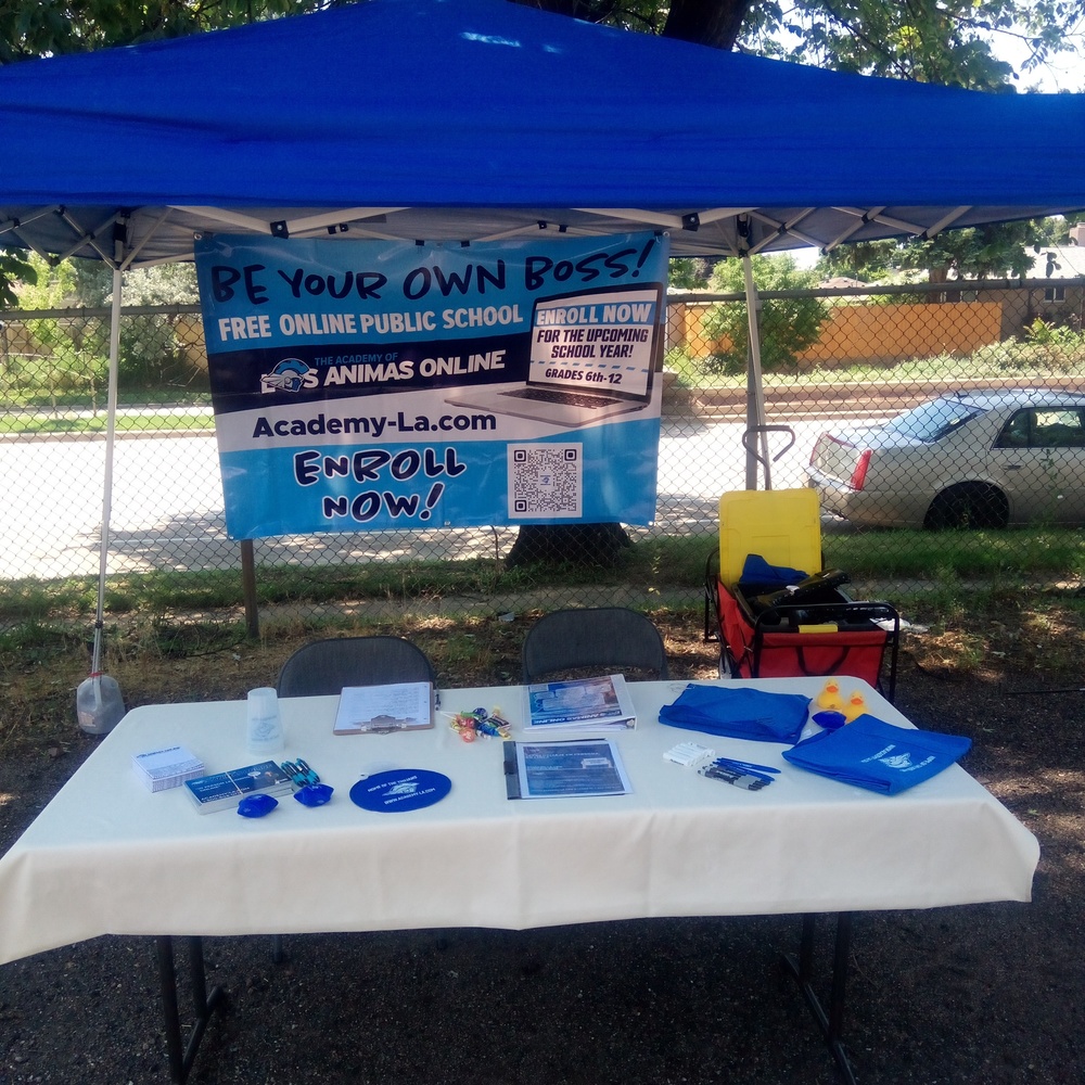 table at summer outreach event