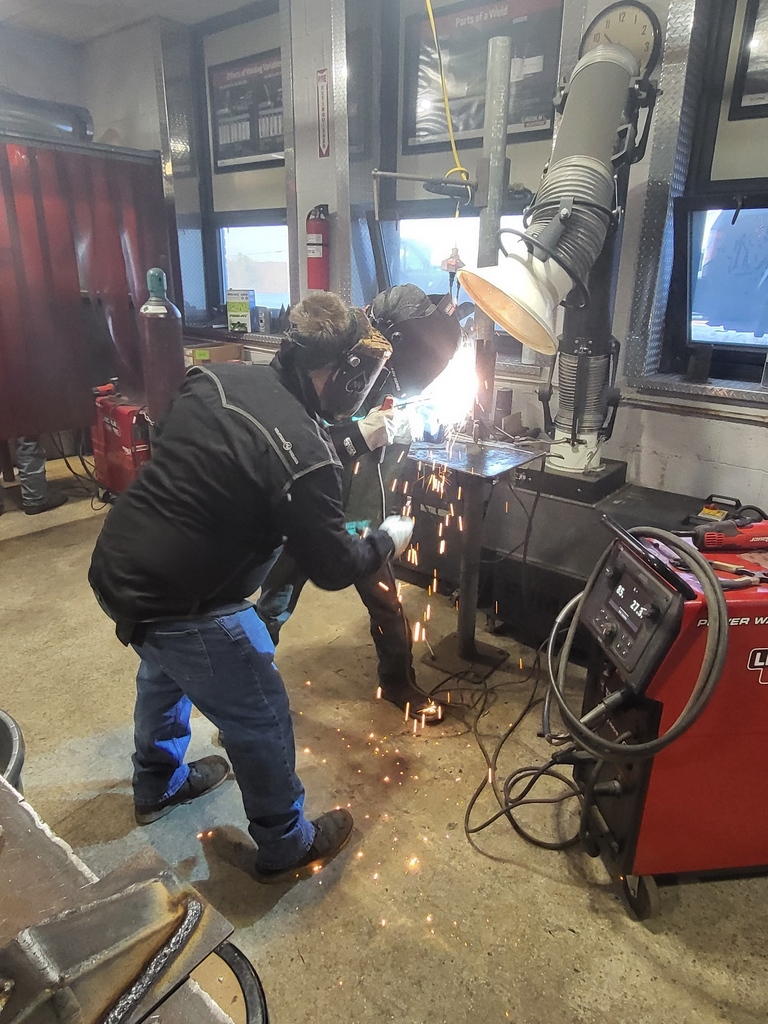 Students at ACE Academy are working hard in the welding lab. 