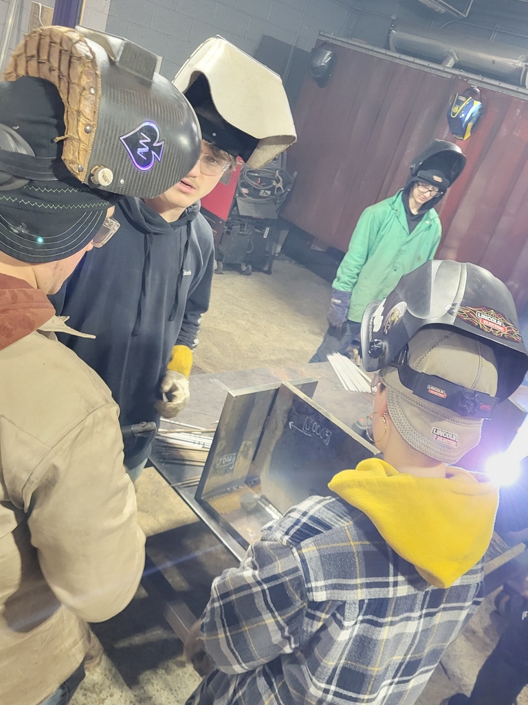 Welding Students participate in welded plates from a nuclear US sub.