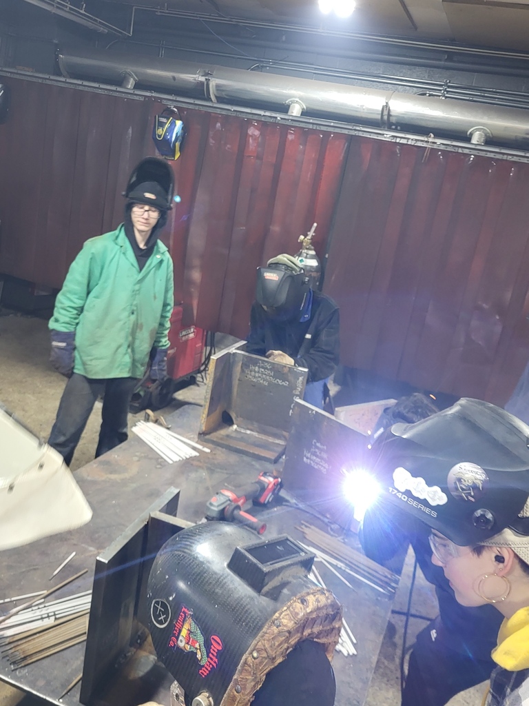 Welding Students participate in welded plates from a nuclear US sub.