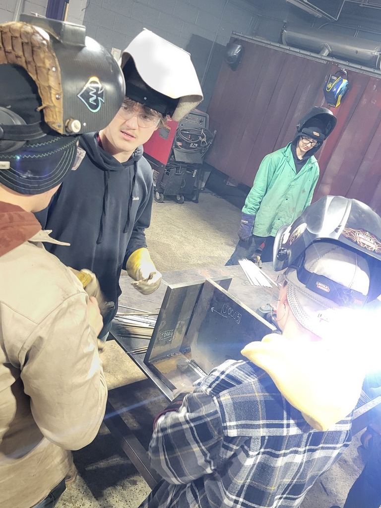 Welding Students participate in welded plates from a nuclear US sub.