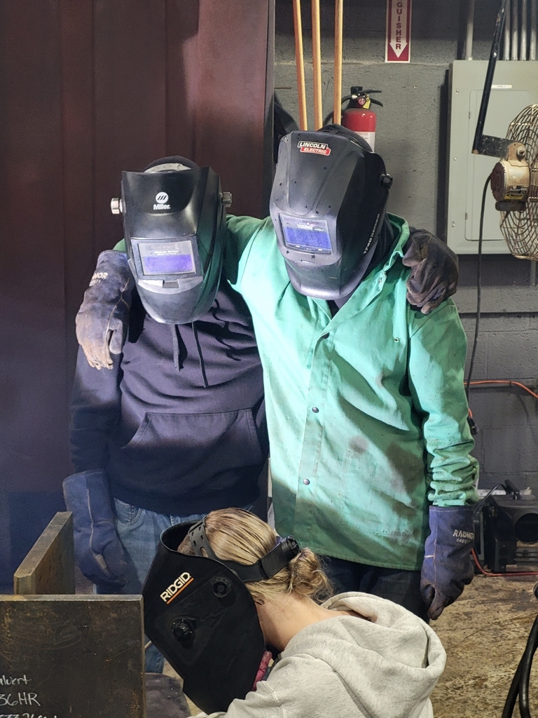 Welding Students participate in welded plates from a nuclear US sub.