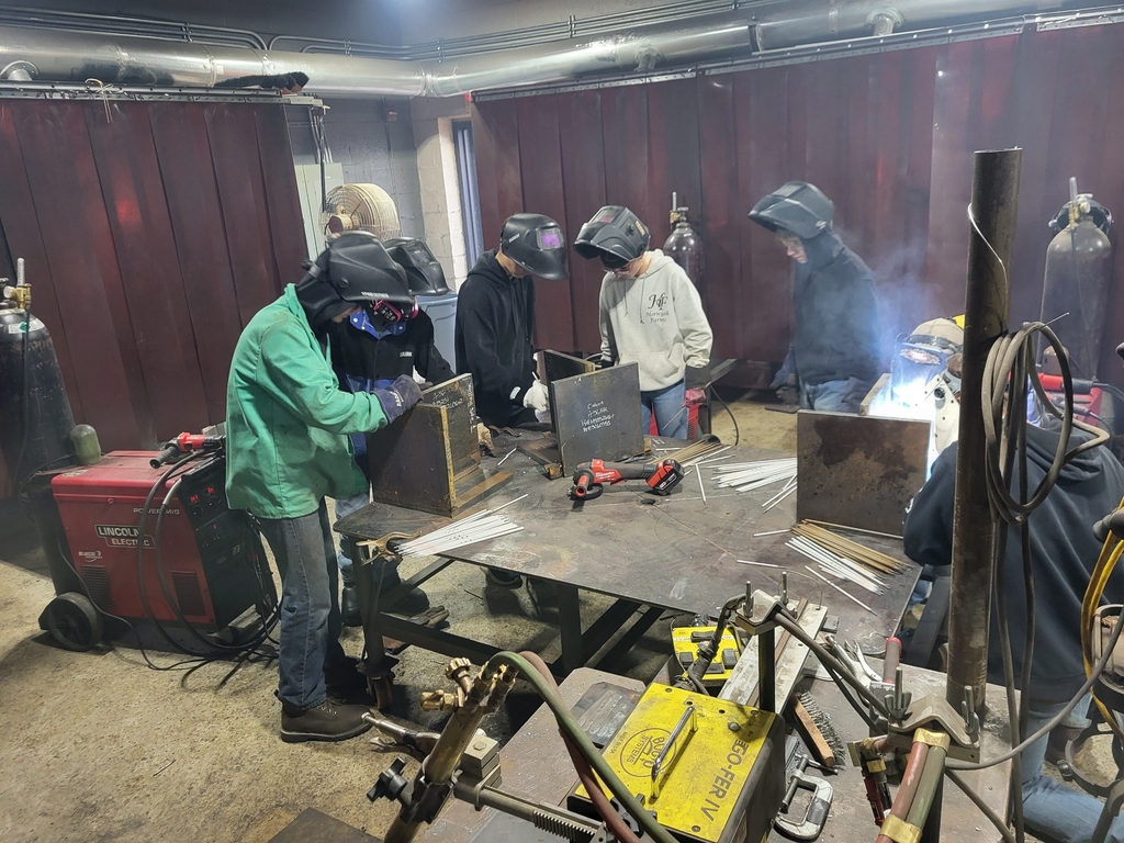 Welding Students participate in welded plates from a nuclear US sub.