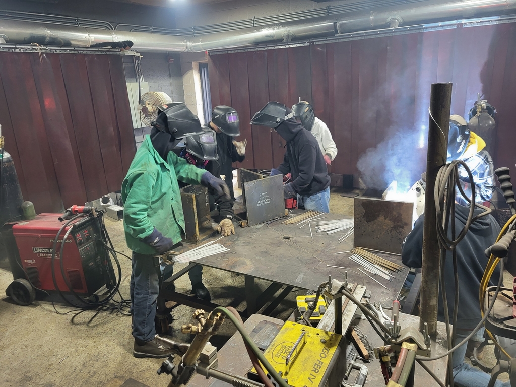 Welding Students participate in welded plates from a nuclear US sub.