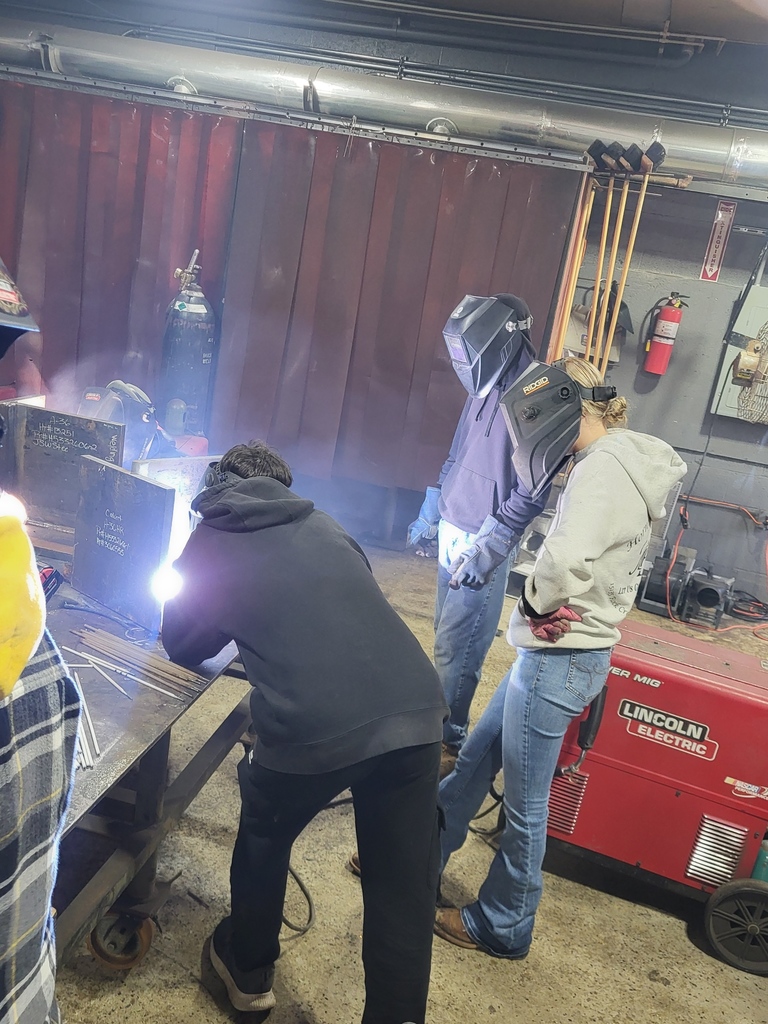 Welding Students participate in welded plates from a nuclear US sub.