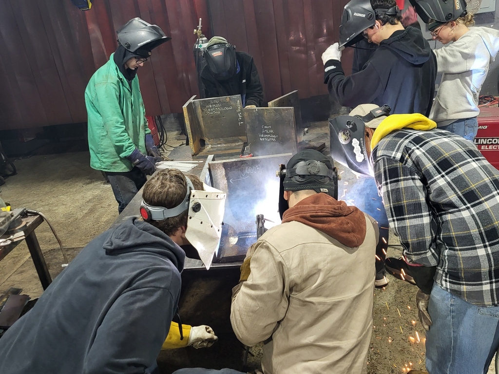 Welding Students participate in welded plates from a nuclear US sub.