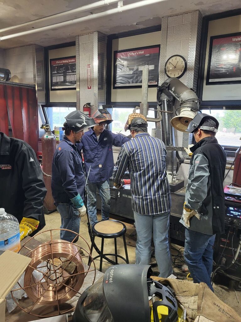 ACE Academy welding students work alongside students from Hawaii.