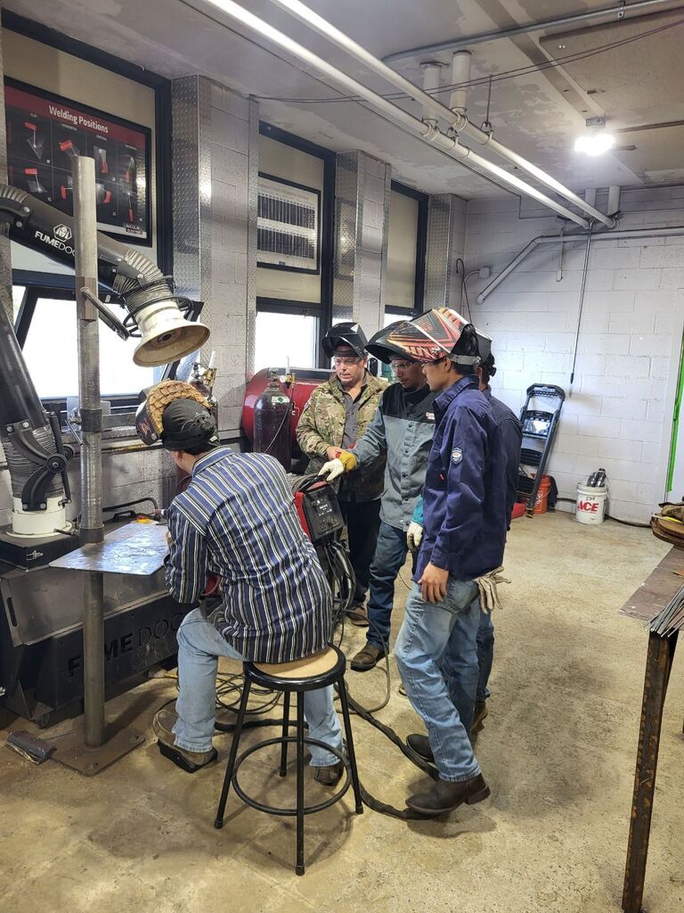ACE Academy welding students work alongside students from Hawaii.